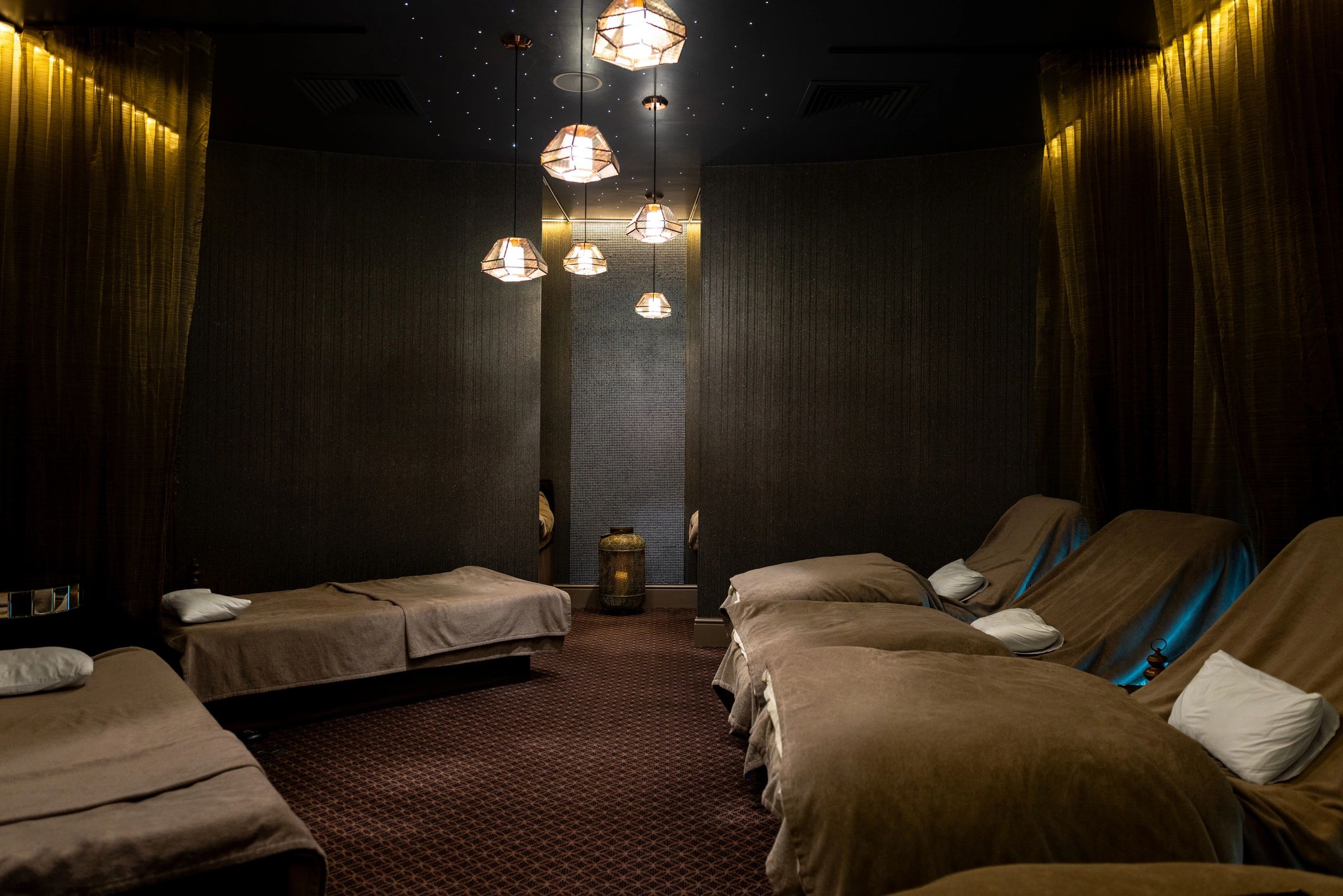 Mediterranean wellness retreat interior with water beds